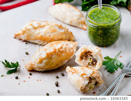 Empanadas with meat and green chili sauce 19363385