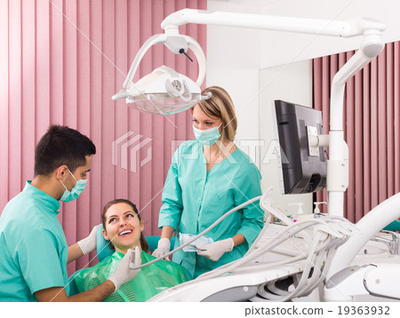 Happy patient at dental clinic 19363932