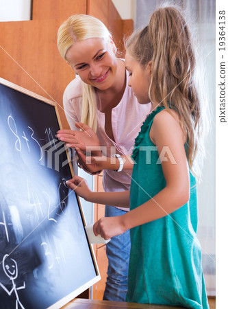 Woman introducing numbers to girl 19364138