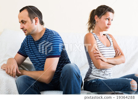 family couple shouting while arguing indoors family couple shouting while arguing indoors 19364288