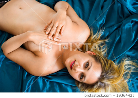 Beauty enticing naked woman sitting 19364425