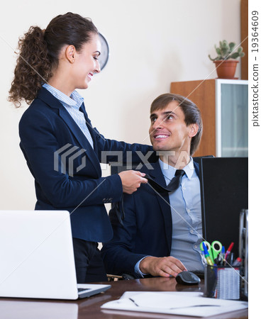 Top manager flirting with subordinate official at workplace 19364609