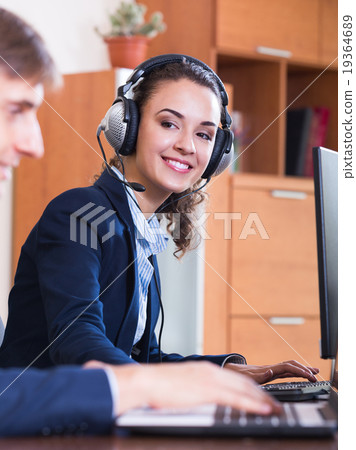 Support team working in call centre. 19364689