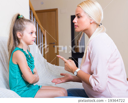 Woman scolding little daughter Woman scolding little daughter 19364722