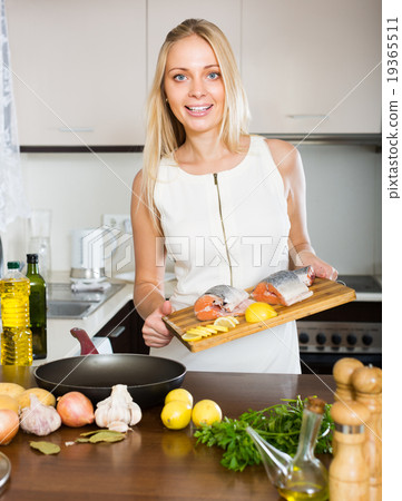 Housewife cooking from salmon 19365511