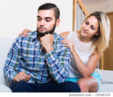 adult asking offended partner for forgiveness at home 19366104