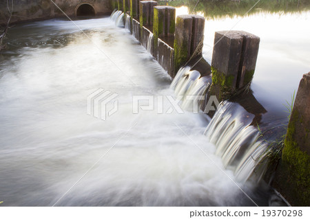 small dam in small village 19370298