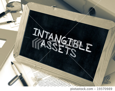 Handwritten Intangible Assets on a Chalkboard. Handwritten Intangible Assets on a Chalkboard. 19370989