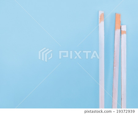 Three White Plank on Blue Stucco Background 19372939