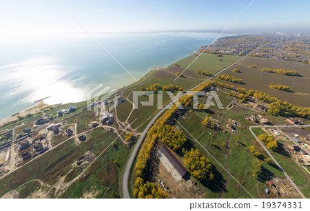 Aerial view of a summer house village at blue sea 19374331