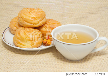 breakfast ,tasty eclairs and lemon tea 19377991