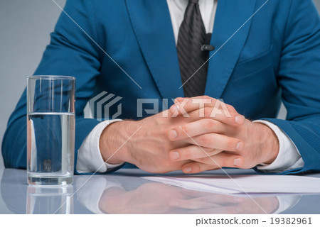 Newsman sitting at his workplace. Newsman sitting at his workplace. 19382961