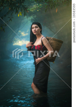 Sexy Asian women standing in creek. Sexy Asian women standing in creek. 19383593