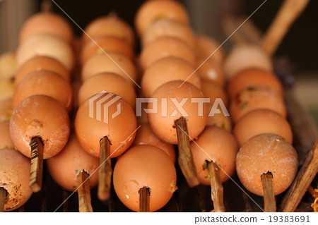 Grilled eggs (Street food),Thailand. 19383691