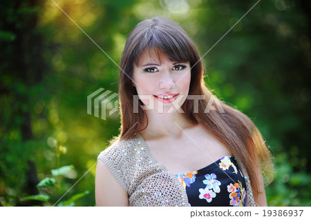 portrait of beautiful girl in the park portrait of beautiful girl in the park 19386937
