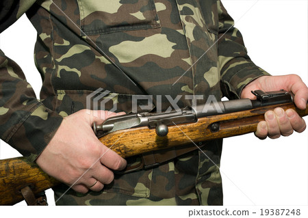 Loaded gun in the hands of an arrow 19387248