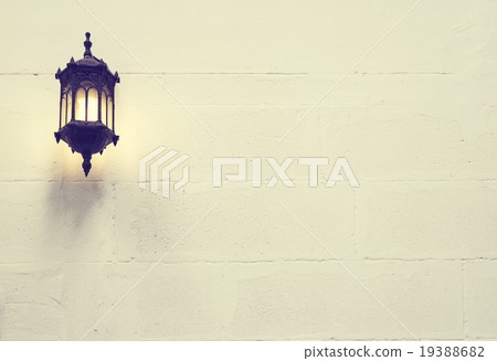 The vintage lamp on cement wall background 19388682