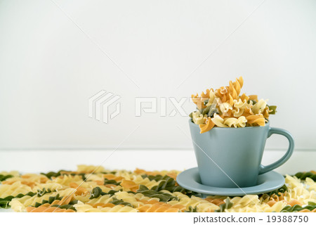 Raw Macaroni or Pasta in Cup with free space Raw Macaroni or Pasta in Cup with free space 19388750