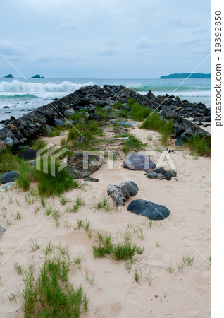 Narrow Path Filled With Big Stones in front of the Narrow Path Filled With Big Stones in front of the 19392850