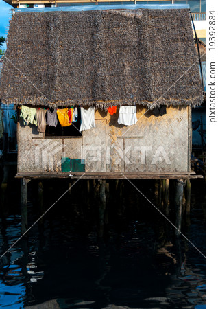 Small Nipa wooden House with close hanging out the Small Nipa wooden House with close hanging out the 19392884