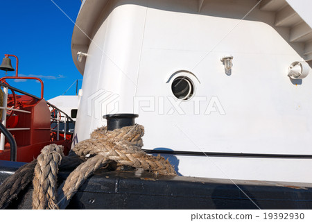 Ship Moored With Old Rope in a Harbor 19392930