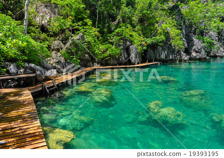 Very Clean and Clear lagoon lake Water next to a Very Clean and Clear lagoon lake Water next to a 19393195