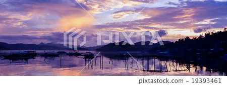 Pretty Pink orange Sky cloudscape over an island Pretty Pink orange Sky cloudscape over an island 19393461