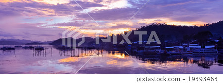 Pretty Pink orange Sky cloudscape over an island Pretty Pink orange Sky cloudscape over an island 19393463