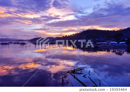 Pretty Pink orange Sky cloudscape over an island Pretty Pink orange Sky cloudscape over an island 19393464