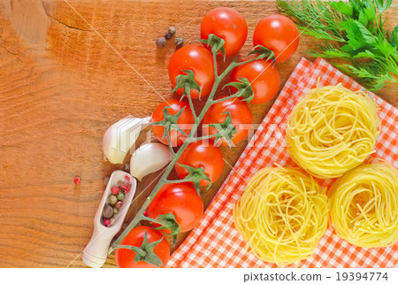 raw pasta and tomato 19394774