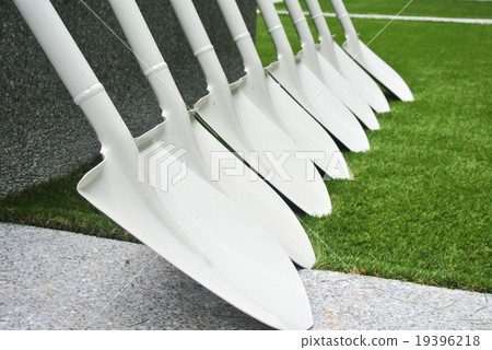 Row of white and clean shovels Row of white and clean shovels 19396218