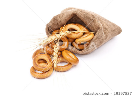 Burlap sack with bagels and ears 19397827