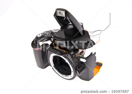 Broken and disassembled DSLR photocamera Broken and disassembled DSLR photocamera 19397897