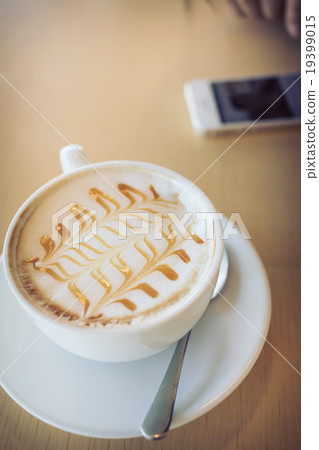 hot of coffee drink on wooden table bar 19399015