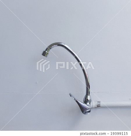 faucet stainless steel on white mortar wall faucet stainless steel on white mortar wall 19399115