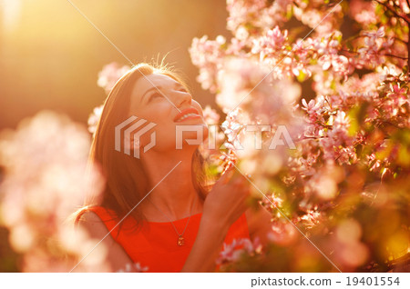 Stock Photo: Pretty spring woman in the garden