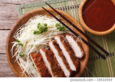 Tonkatsu breaded deep fried pork with cabbage 19410593