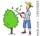 Man in garden trimming bush 19410665