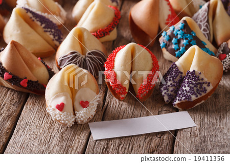 Fortune Cookies decorated with candy sprinkles Fortune Cookies decorated with candy sprinkles 19411356