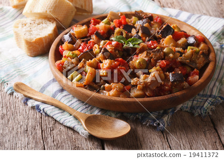 Italian appetizer Caponata close-up on a plate Italian appetizer Caponata close-up on a plate 19411372