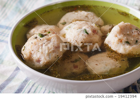 Bread dumplings with broth, close-up on the table Bread dumplings with broth, close-up on the table 19412394
