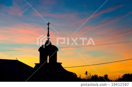 Silhouette of church against the colorful sunset Silhouette of church against the colorful sunset 19412597