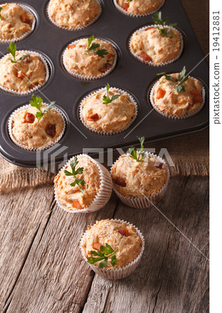 Delicious muffins stuffed with meat close up 19412881