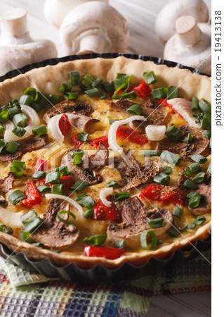 French mushroom tart close-up on the table French mushroom tart close-up on the table 19413138