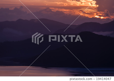 Silhouette of Mountains Above the Water under Silhouette of Mountains Above the Water under 19414047