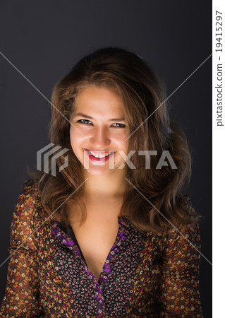 Young brunette woman with beautiful smile Young brunette woman with beautiful smile 19415297