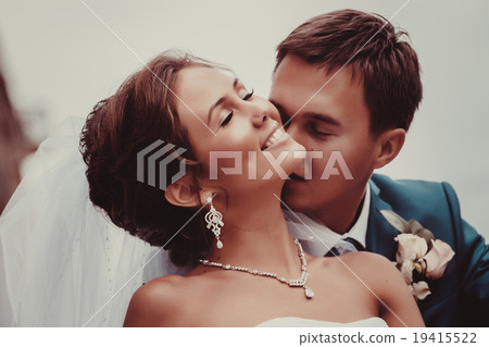 Happy bride and groom on their wedding 19415522