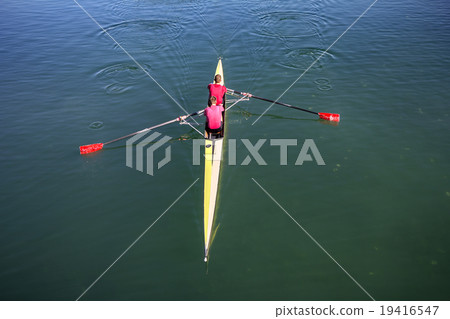 Two rowers in a boat Two rowers in a boat 19416547