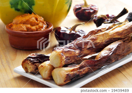 barbecued calcots, catalan sweet onions, and romesco sauce 19439489