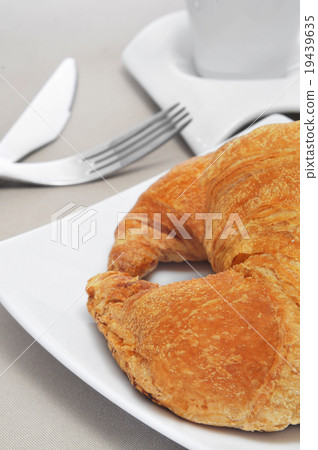 croissant and coffee croissant and coffee 19439635